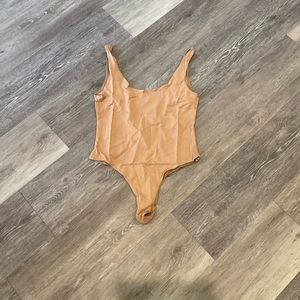 Tan bodysuit